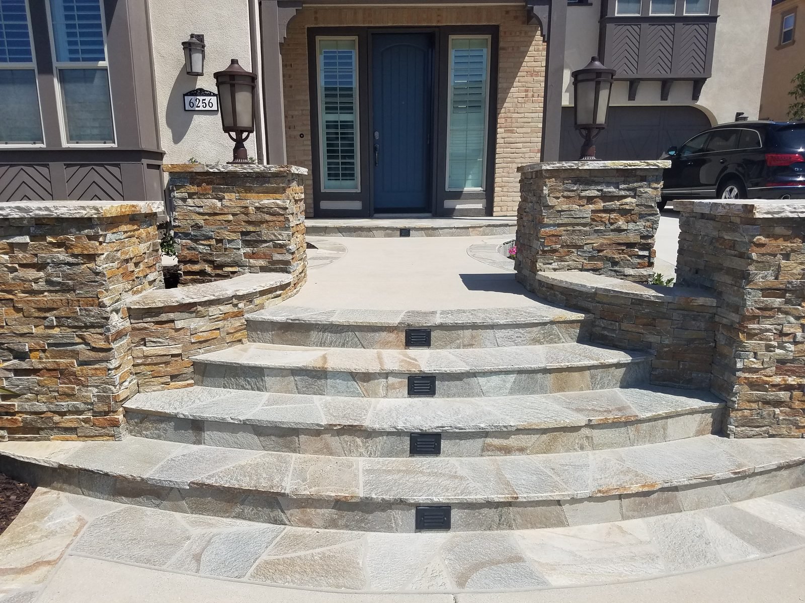 Fre Xie Residence — Stacked-stone entry steps and planting