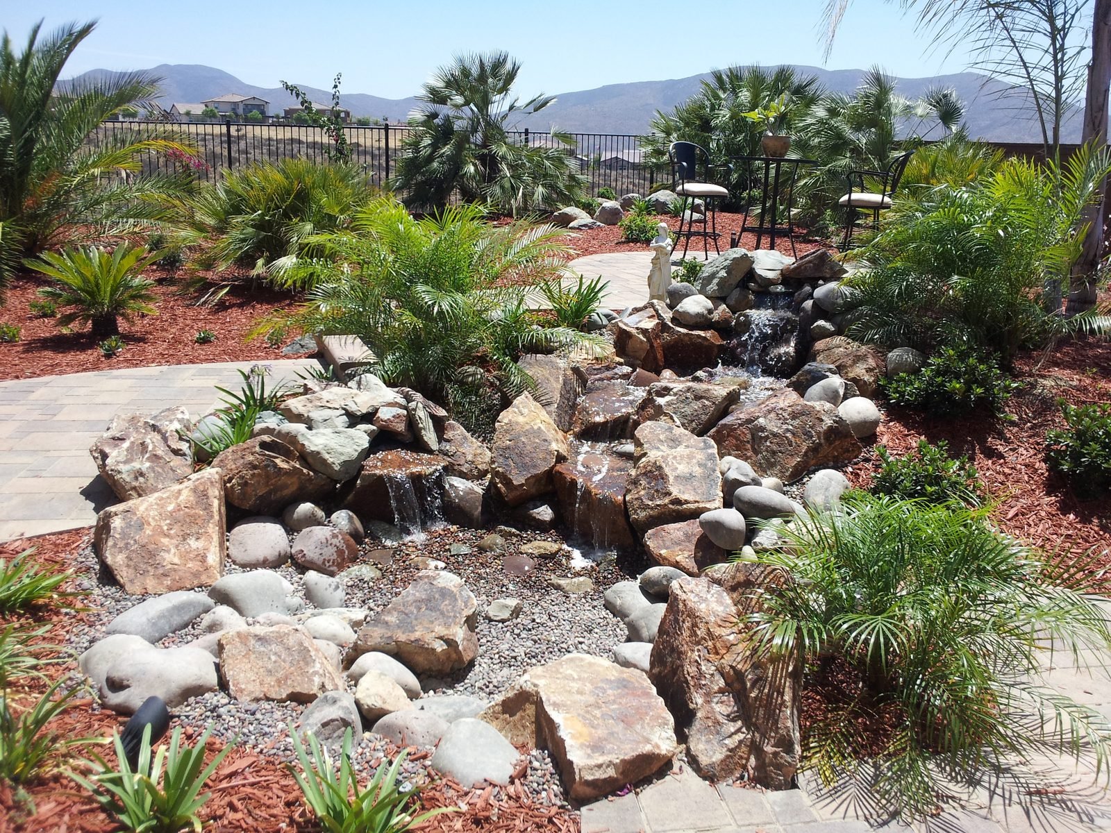 Russel Residence — Boulder waterfall and dry-creek run with the view