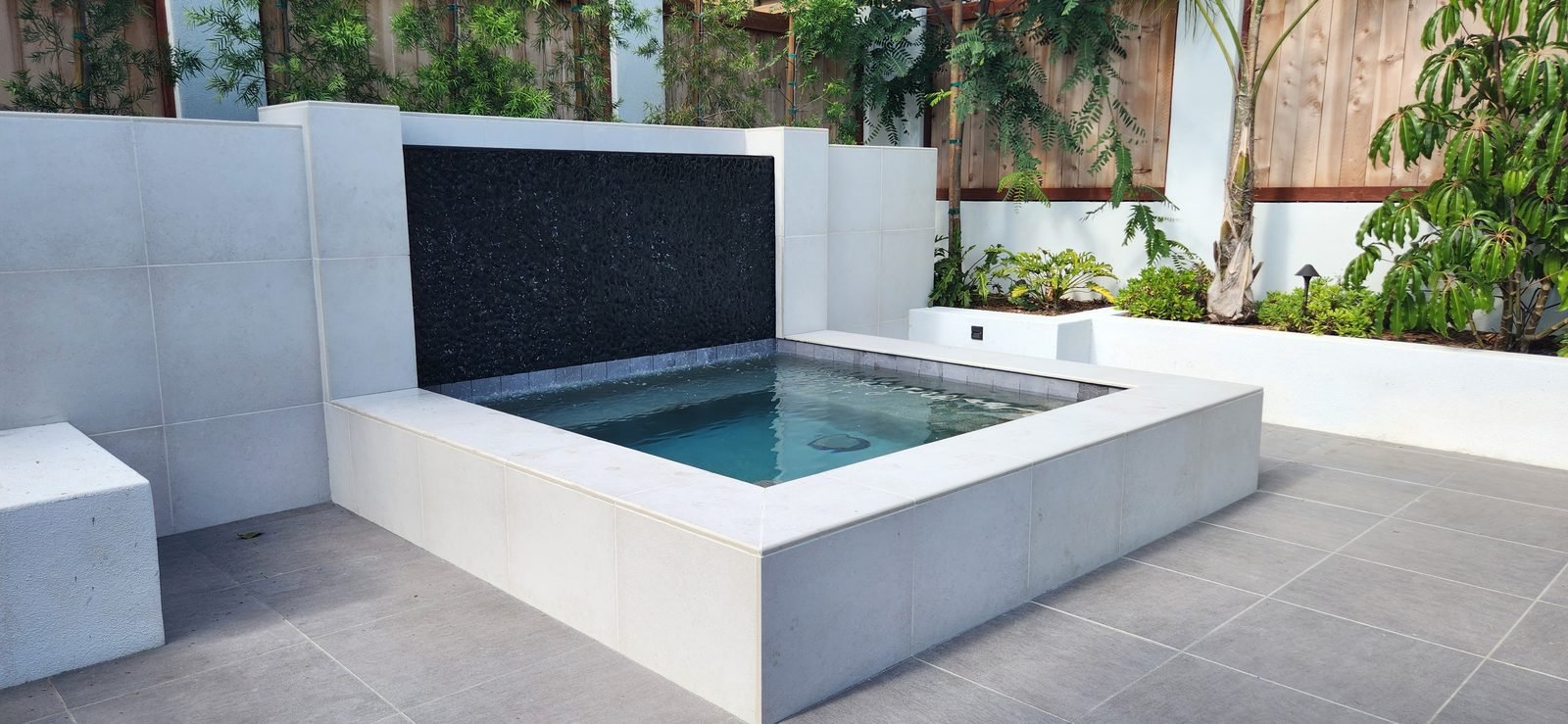 Spa with a wet-wall water feature, San Diego County